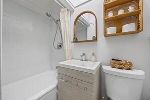 Hair dryer, towels, soap, toilet paper