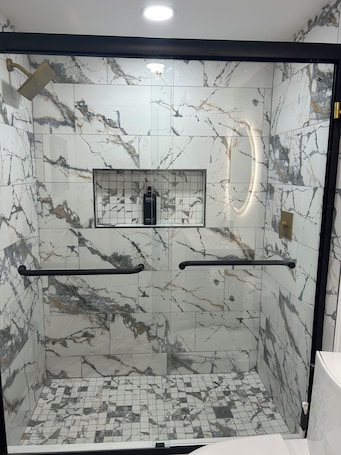 Shower, hair dryer, soap, toilet paper. The Royal Suite - Ronkonkoma