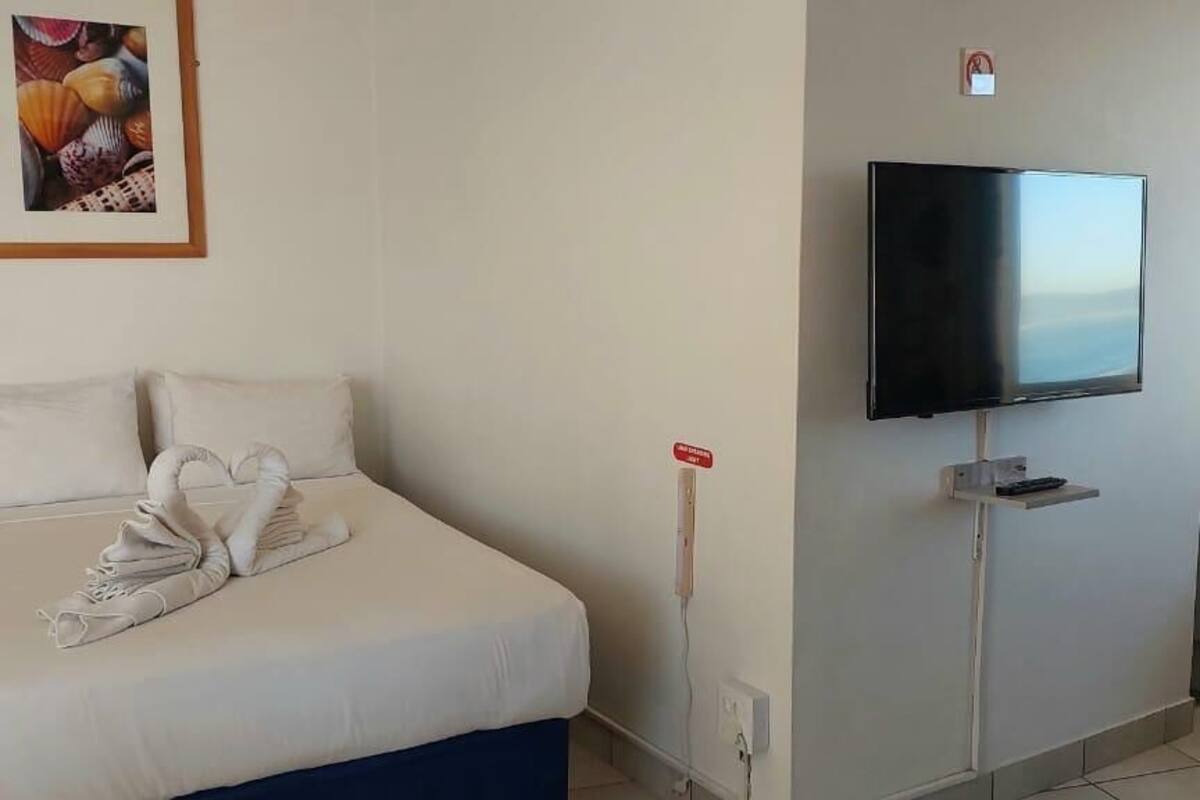 Family Apartment, Sea View | In-room safe, laptop workspace, blackout drapes, iron/ironing board