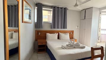 Standard Room, Partial Sea View | In-room safe, laptop workspace, blackout curtains, iron/ironing board
