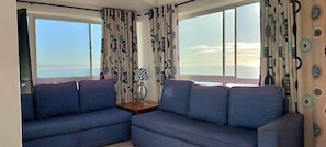 Deluxe Apartment, Sea View | Living area