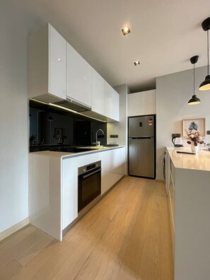 Superior Apartment, 1 Bedroom, Balcony, City View | Private kitchen | Fridge, eco-friendly cleaning products