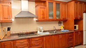 Fridge, coffee/tea maker, electric kettle, toaster