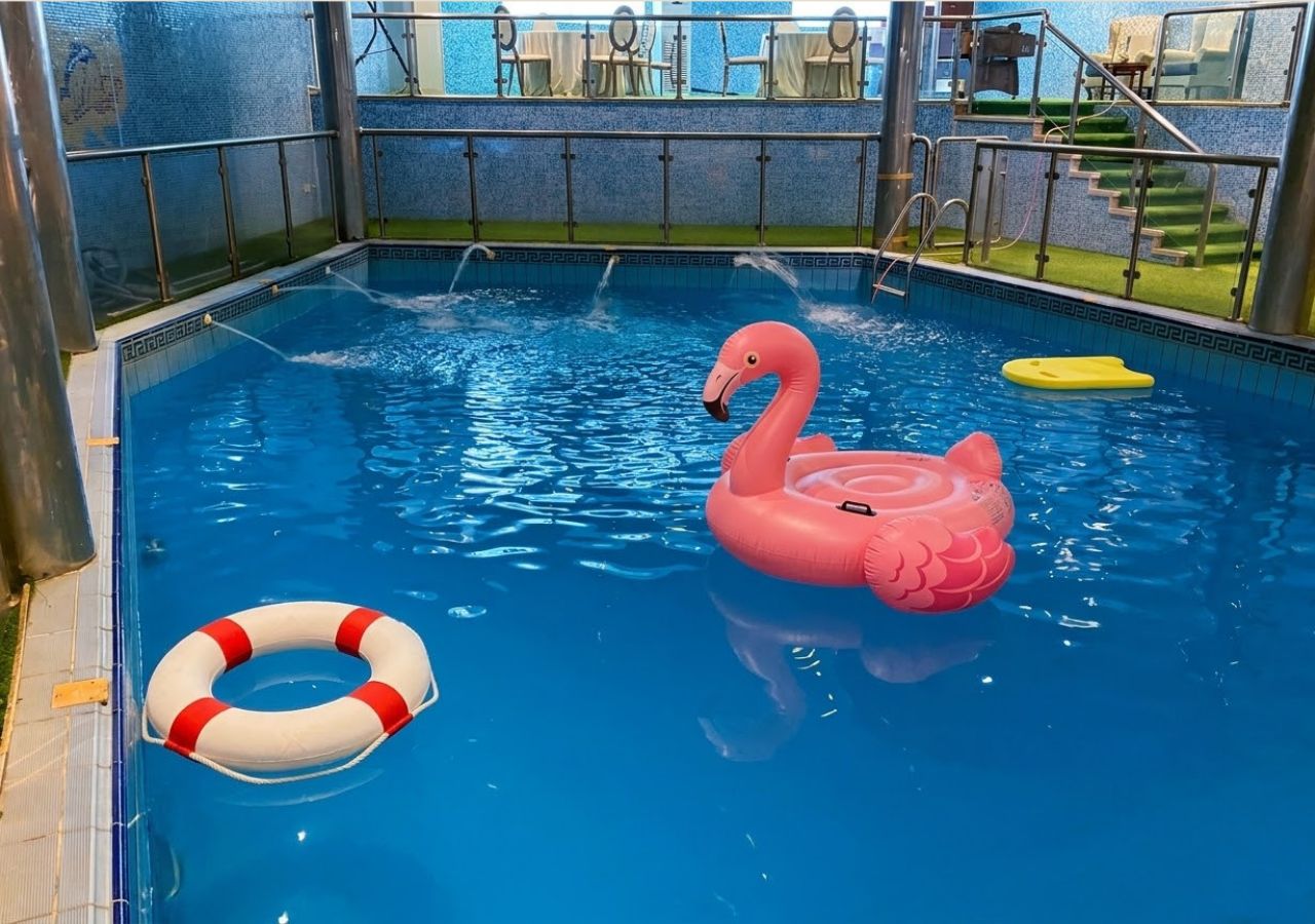 Indoor pool, open 9:00 AM to 6:00 PM, pool loungers