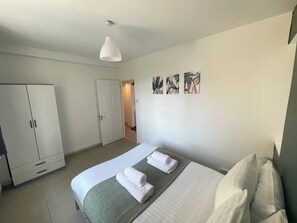 3 bedrooms, desk, iron/ironing board, travel cot