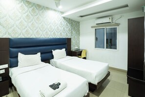 Twin Room | Bathroom | Shower, towels - Hotel Marigold Atnest Gachibowli (Hyderabad)