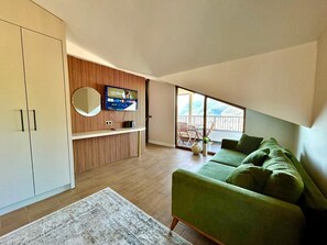 Deluxe Penthouse, 1 Queen Bed with Sofa bed, Balcony, Sea View | Individually decorated, desk, free WiFi, bed sheets