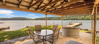 Lakefront retreat with private dock, open living, fire pit, full kitchen & cozy indoor spaces