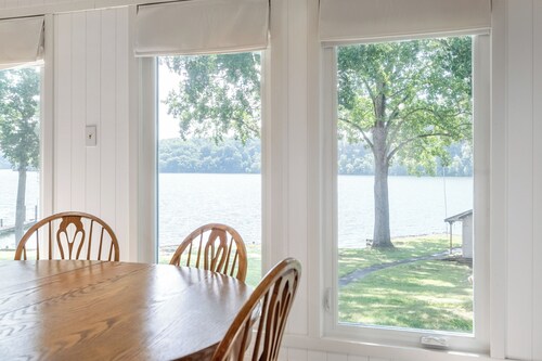 Lakefront retreat with private dock, open living, fire pit, full kitchen & cozy indoor spaces