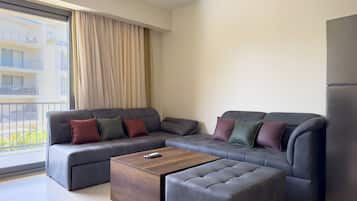 Comfort-Apartment, Balkon, Poolblick | Wohnbereich