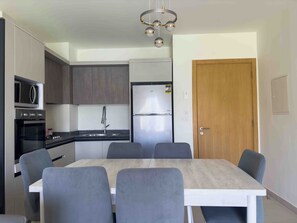 Appartement Classique, vue piscine | Coin séjour