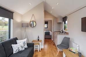 Appartement Standard, balcon, vue lac | Coin séjour