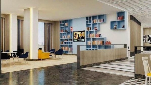 A modern lobby with a reception desk, seating area, and bookshelves. - MIGROLINO (Lucknow)