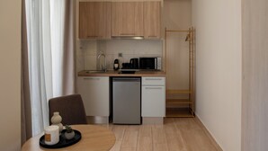 Enkeltrom – standard | Eget kjøkken | Espressomaskin, minikjøleskap, kokeplater og vannkoker