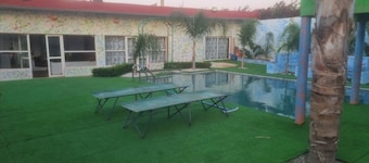 Air-conditioned family accommodation garden with private pool