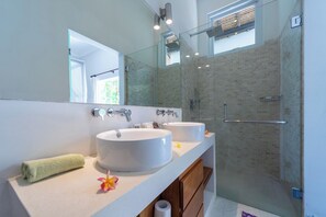 Shower, hair dryer, towels, soap