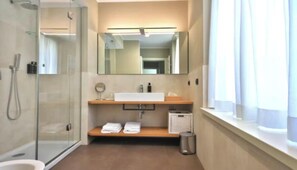 Hair dryer, bidet, towels, soap