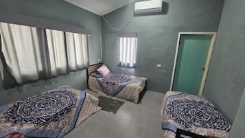3 slaapkamers, een strijkplank/strijkijzer, internet, beddengoed