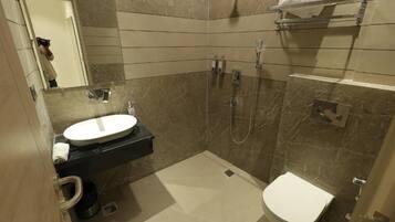 Shower, slippers, towels, soap