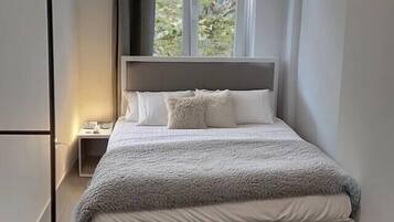 1 dormitorio, cuna de viaje, wifi y ropa de cama