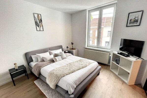 1 habitación, tabla de planchar con plancha, wifi y ropa de cama 