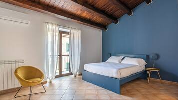 Apartamento, 1 cama de casal e sofá-cama, vista para a cidade | Ferros/tábuas de passar roupa, Wi-Fi de cortesia