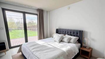 1 slaapkamer, een strijkplank/strijkijzer, wifi, beddengoed
