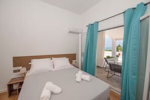 2 habitaciones, tabla de planchar con plancha y cuna de viaje 