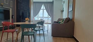 Condo, 1 Bedroom, Patio, City View | Living room