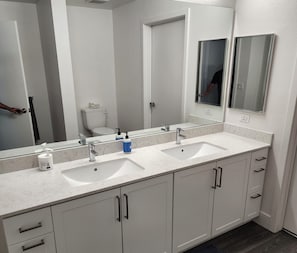Hair dryer, towels, soap, toilet paper