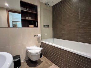 Hair dryer, towels, soap, toilet paper