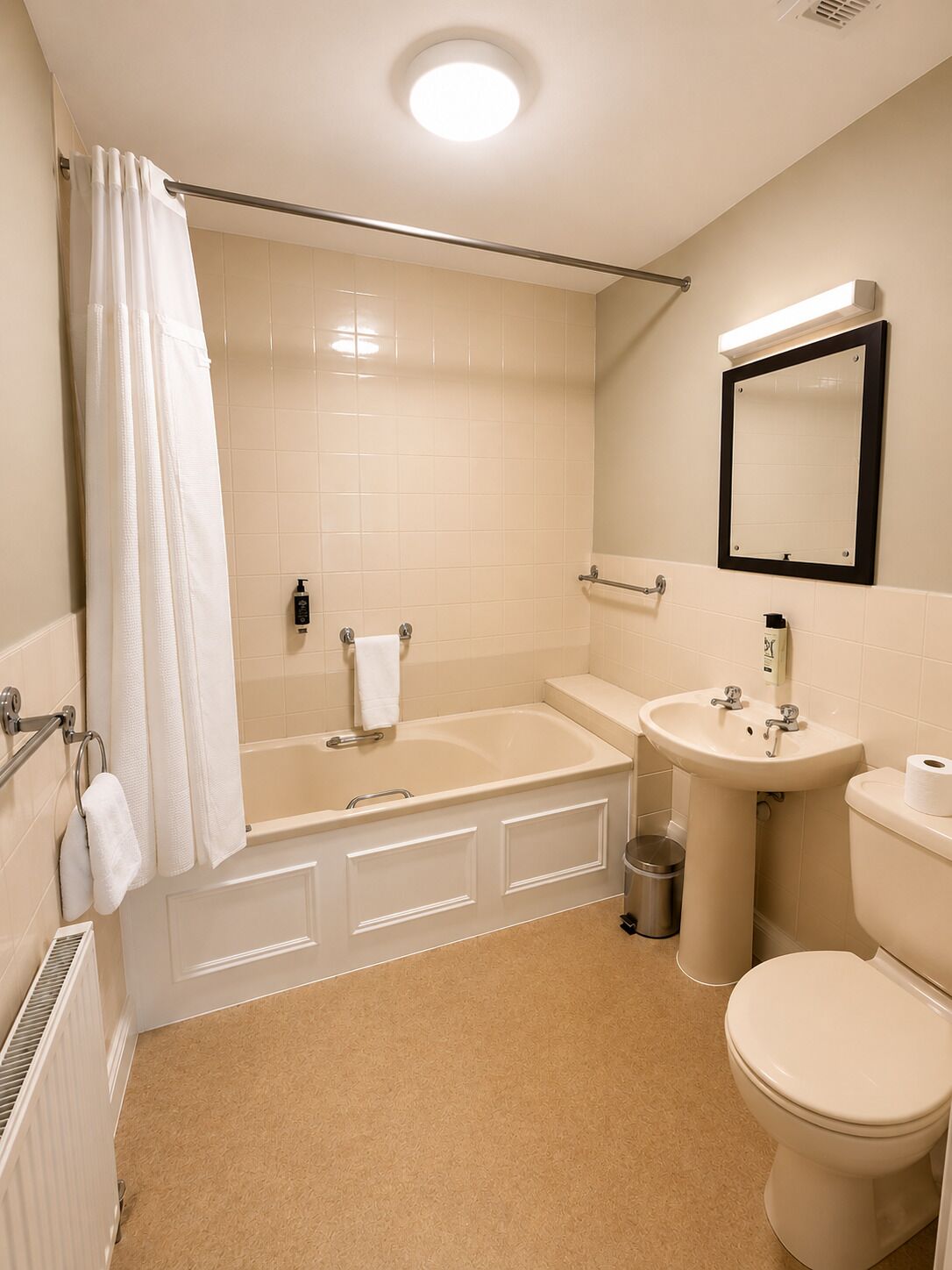 Combined shower/bathtub, towels, soap, shampoo