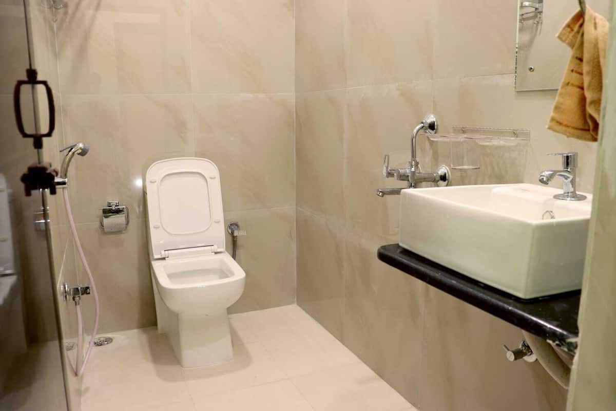 Slippers, towels, soap, toilet paper