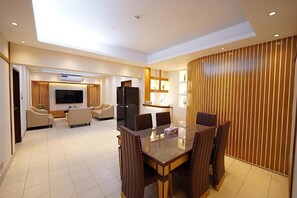 Executive Room, 1 King Bed, City View | Living area | Fireplace, printers