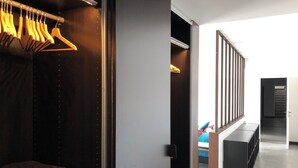 A modern interior with a walk-in closet, a staircase, and a view into another room. - CONTEMPORARY VILLA 350 m2 SEA VIEW SWIMMING POOL (Nice)