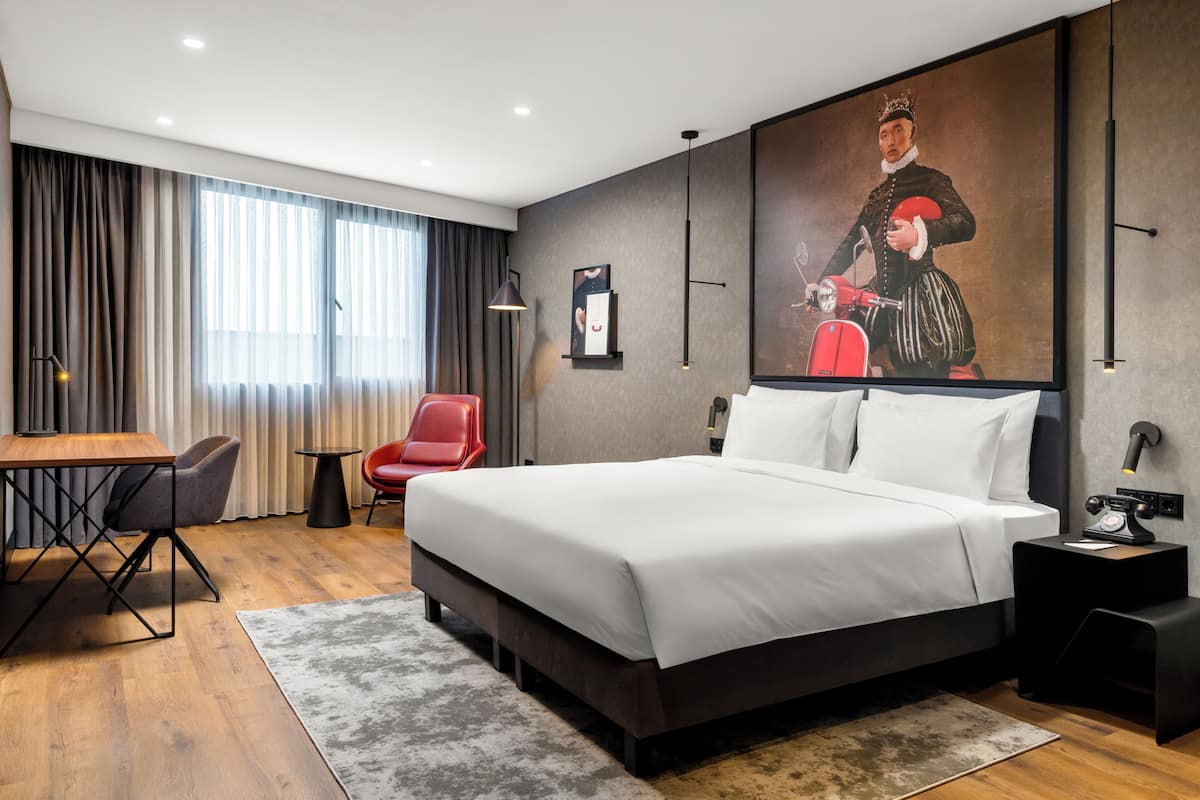 Habitación Premium | Ropa de cama de alta calidad, edredones de plumas, cunas gratuitas