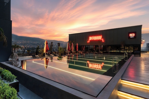 Outdoor pool, open 9:00 AM to 9:00 PM, pool umbrellas, sun loungers
