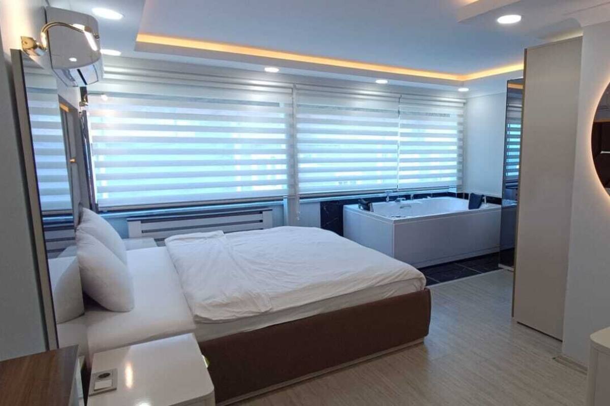 Family Studio Suite, 2 Bedrooms | Iron/ironing board, free WiFi