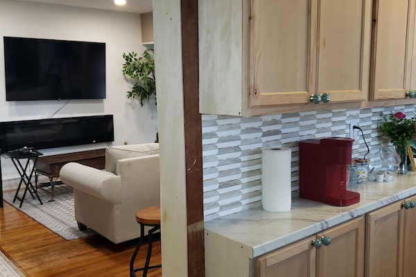 As you enter apartment 4, you will see your kitchen/dining/living room space.