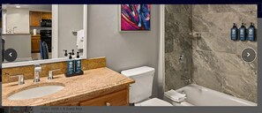 Jetted bath, hair dryer, towels, soap
