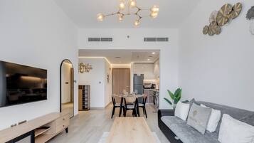 Deluxe Apartment, 2 Bedrooms, Kitchen, City View | Living area | 43-inch flat-screen TV with cable channels, Netflix, streaming services