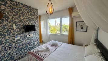 Deluxe-Doppelzimmer, Gartenblick | Schallisolierte Zimmer, kostenloses WLAN