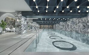 Indoor pool, open 7:00 AM to 11:00 PM, lifeguards on site