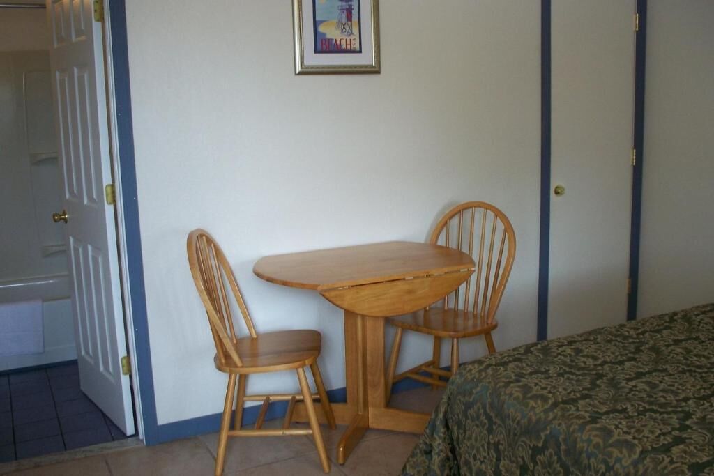 Quarto solteiro, 1 cama Queen | Ferros/tábuas de passar roupa, Wi-Fi de cortesia
