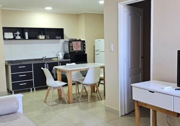 Comfort Apartment | Living area | Flat-screen TV