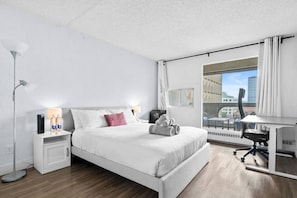 1 bedroom, desk, iron/ironing board, travel crib