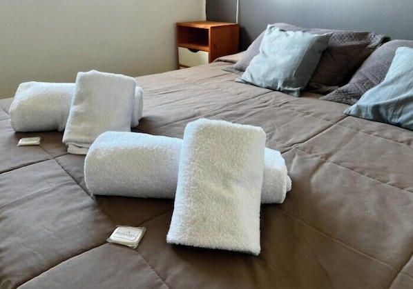 Deluxe Duplex | Premium bedding, pillow-top beds, blackout curtains, free WiFi