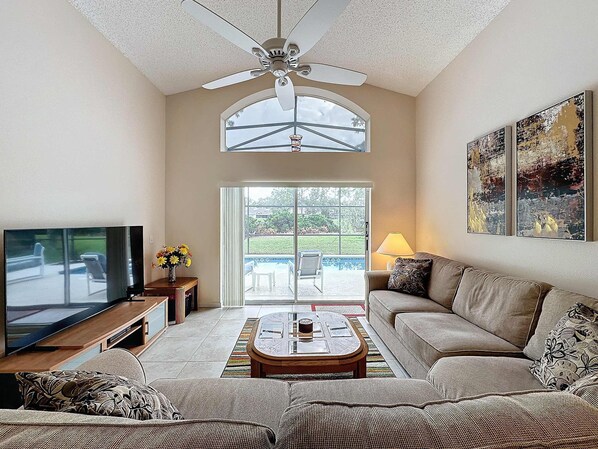 House, Multiple Beds, Pool Access, Pool View (South Facing Pool Home with Golf) | Living area - South Facing Pool Home With Golf Course Views (Haines City)