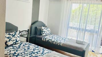 2 chambres, accès au Wi-Fi (inclus), literie fournie