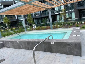 Outdoor pool, a heated pool - Luxurious 2-Bed, 2-Bath Furnished - 5 Star Resort (Innisfil)